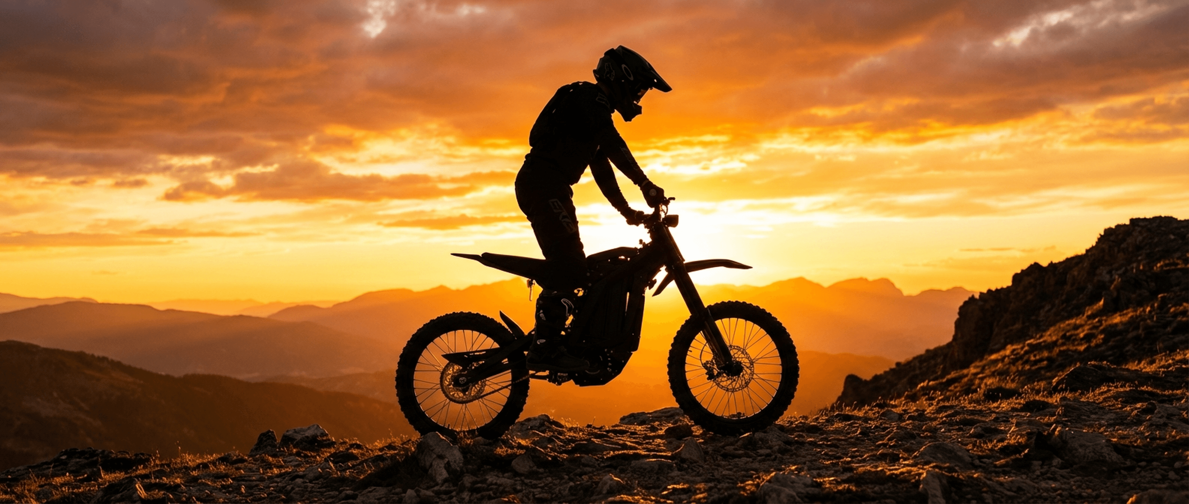 SS 3.0 rider silhouette at mountain summit