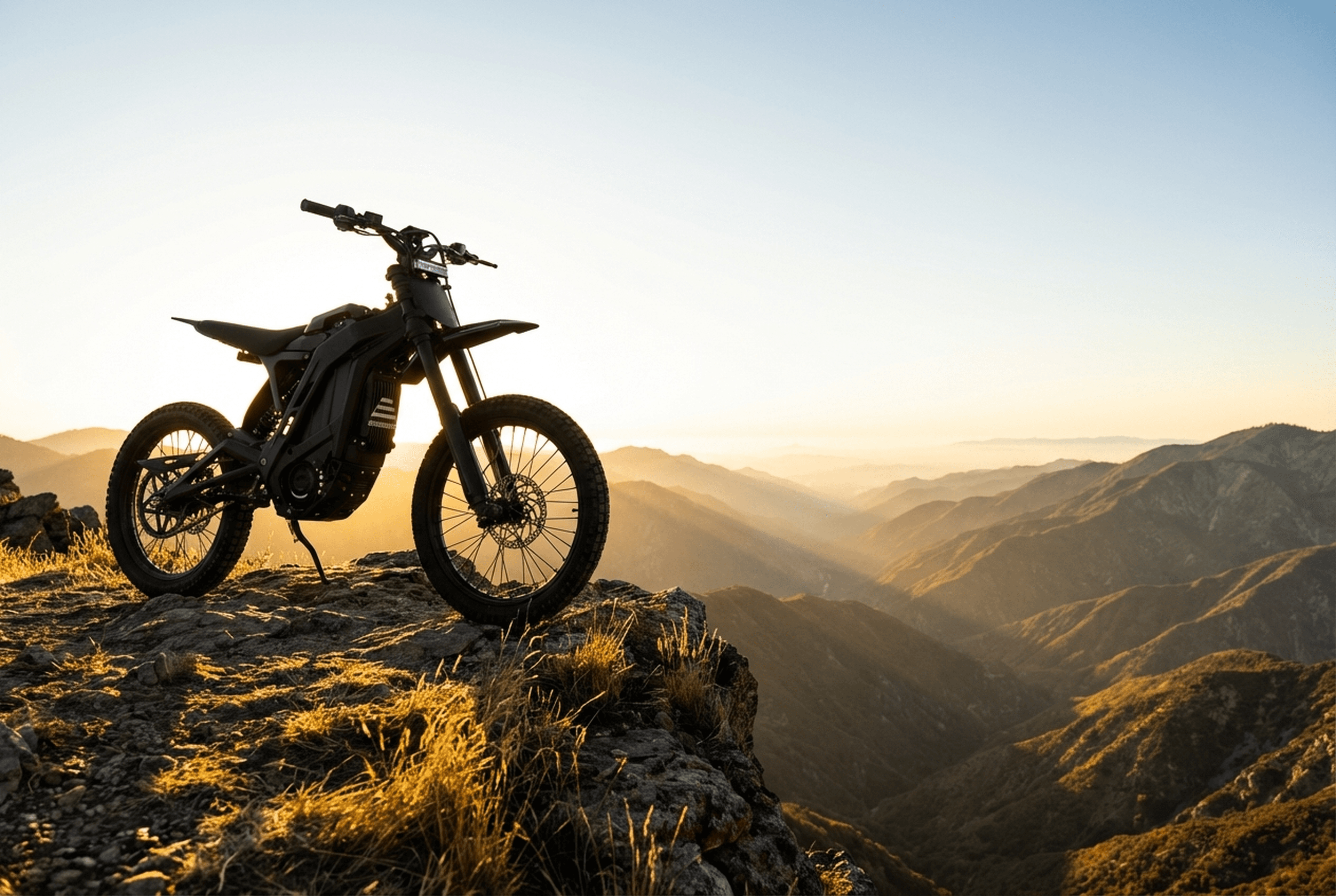 E Ride Pro SS 3.0 silhouette against mountain sunrays